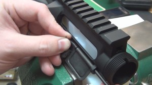 AR-15 Ejection Port Cover Assembly - thearmsguide.com